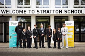 Principal Sam Farmer with students from Stratton School celebrating a highly positive Ofsted report.