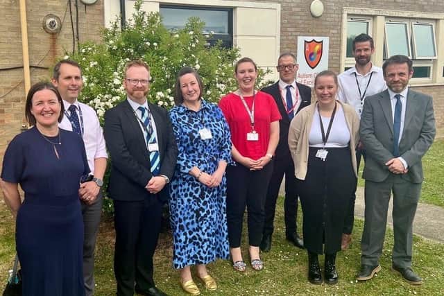 Celebrating the official opening of Stratton School's ACE. L-R: Amana Gordon, Andy Daly, Sam Farmer, Mary Abeyasekera, Amy Wright, Adam Zerny, Pearl Houghton, Iain Berry, Daniel Newbolt