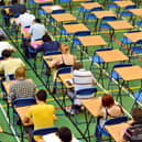 File photo of A-level students sitting an A-level math exam inside a sports hall.