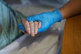 Woman in care home. (Photo by Hugh Hastings/Getty Images)