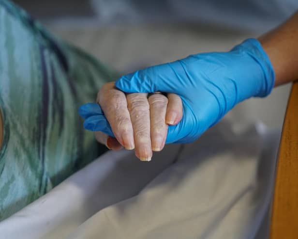 Woman in care home. (Photo by Hugh Hastings/Getty Images)