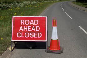 File photo of a road closed sign