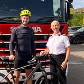 Tom Pyman pictured with ACFO Alison Kibblewhite outside Potton  Fire Station.