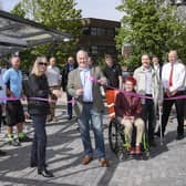 Biggleswade station manager Fiona Blackwell and MP Richard Fuller, supported by members of the community, declare the new cycle hub open. Photo: Peter Alvey.