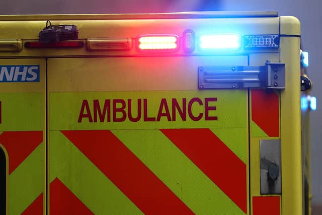 Emergency flashing lights are seen on an ambulance at Royal London Hospital (Photo by Peter Nicholls/Getty Images)