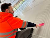 Workman drops daughter's i-phone on a soon-to-be frozen ice-rink and it's been frozen over