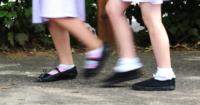File photo date 15/07/14 of a generic stock photo of school girls walking to school.