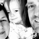 Robin pictured with his parents Rachel an Nick Samuel
