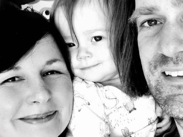 Robin pictured with his parents Rachel an Nick Samuel