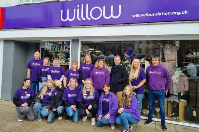 Staff and volunteers outside the new Willow shop in  the High Street which was officially opened by the mayor Grant Fage