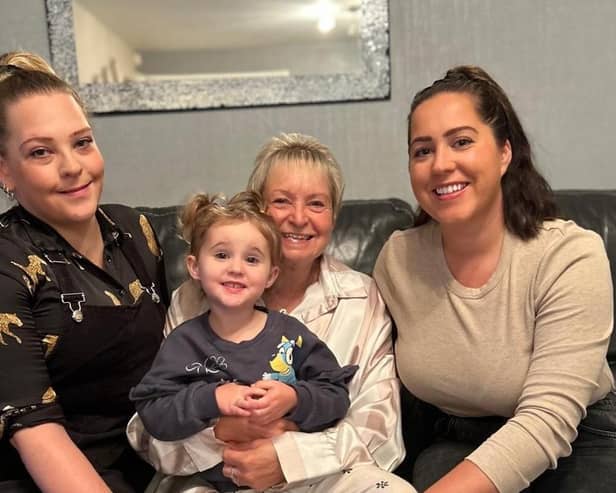 Angela with Bourn Hall daughters Becky and Nicky and granddaughter Cleo