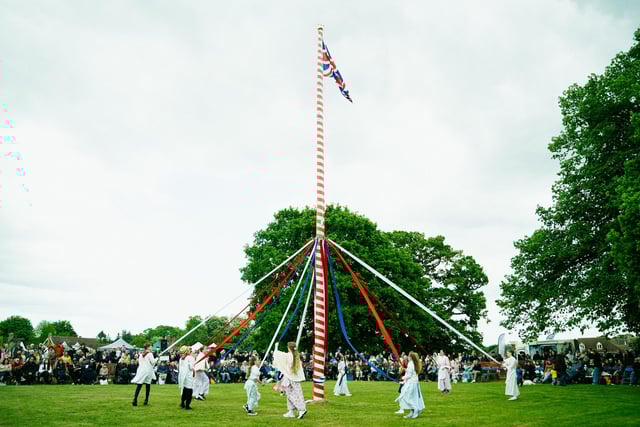 The junior maypole dancers who performed magnificently even with the challenge of the blustery weather