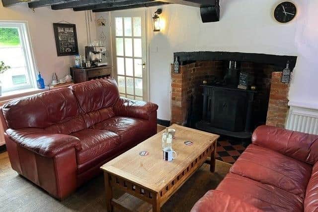 The ground floor trade space provides a well-presented main bar area, with central wooden servery,  space for around 40 covers, mix of wood and tiled flooring and two fireplaces.