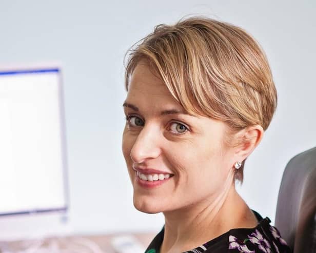 Gillian Harvey at her desk