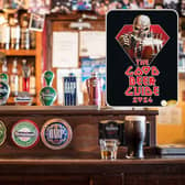 A bar in a pub and, inset, the front cover of the CAMRA Good Beer Guide 2024