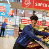 A person working in Aldi. Pic supplied by Aldi.