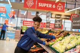 A person working in Aldi. Pic supplied by Aldi.