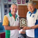 Terry Butt handing the John Gabbitas Scroll to Ted Houldey