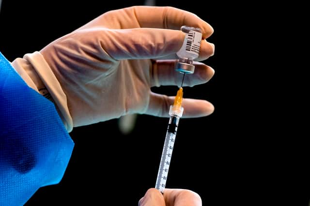 The Pfizer/BioNTech vaccine could be reducing the viral load - what does that mean? (Photo: TIZIANA FABI/AFP via Getty Images)