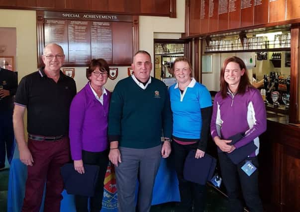 New Year Texas Scramble winners: Alistair Collin, Paula Collin, Vicky Collin and Laura Collin with Dave Wilsher, Club Captain in centre.