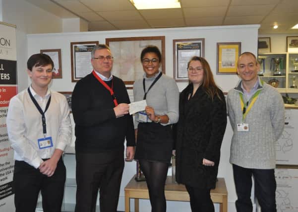 Samuel Whitbread Academy donation to town's Christmas Lights Committee.