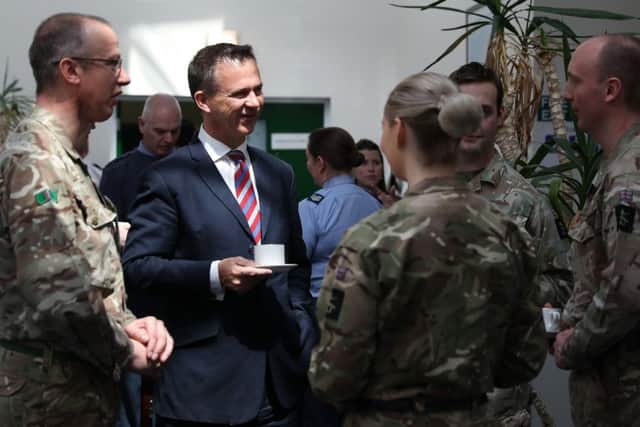 In this image; Minister for State for the Armed Forces, Colonel the Right Honourable Mark Lancaster TD VR MP  meets with the Regimental Sergeant Major (RSM) WO1 Thomas (far left) and soldiers of the Intelligence Corps at Joint Intelligence Training Group (JITG) Chicksands in Bedfordshire.Minister for State for the Armed Forces, Colonel the Right Honourable Mark Lancaster TD VR MP is being hosted by members of the Armed Forces intelligence community, who will provide an overview of the capabilities of Intelligence Analysts from across the Army, Navy and Royal Air Force.