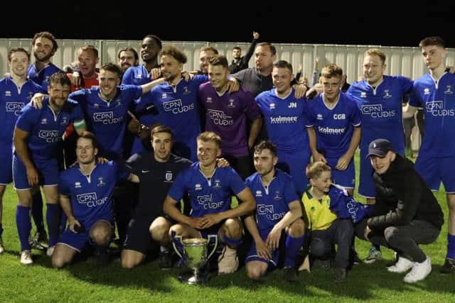 Potton United with the North Beds Charity Cup. Picture: Derek Blatch.
