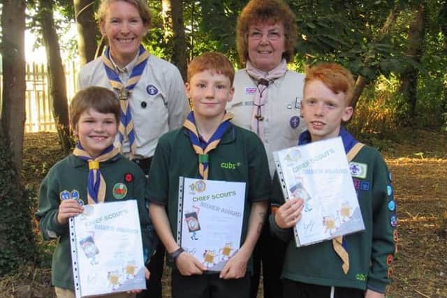 Langford cubs receive chief scout silver awards - they are with Jo Smith, 1st Langford Cubs Akela and Jan Brooker, Biggleswade district commissioner.