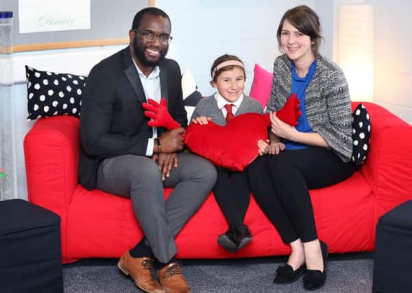 Joseph Quashie, from CALA Homes, Cerys and Christine Dunne