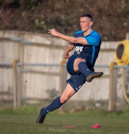 Phil Payne in action for Arlesey last week. Picture: Guy Wills
