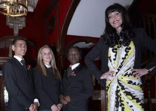 Taelre Presland with the other contestants and Hilary Devey on The Intern