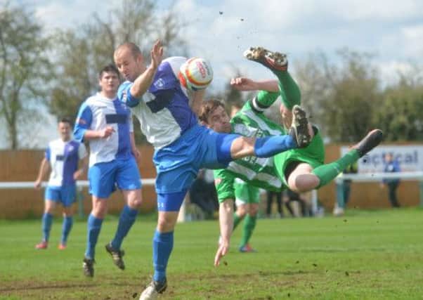 Action from Biggleswade Town's defeat to Burnham on Saturday