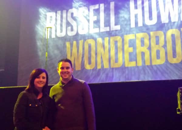 Sam Burton proposed to girlfriend Fran Gray in front of thousands of people at a Russell Howard gig. PNL-140304-123310001