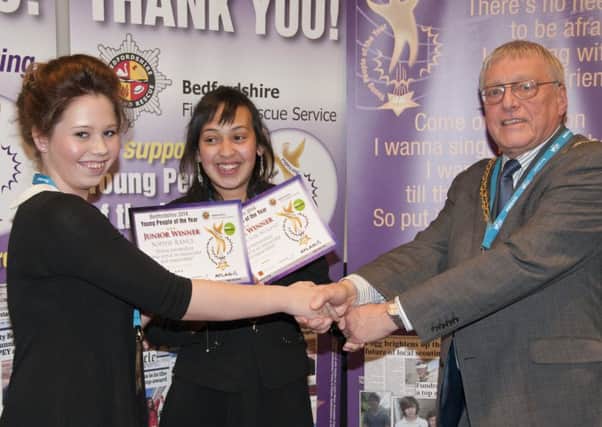 L-R Sophie Rance and Amber Hector-Nugent are presented with their YOPEY 2014 prize by Cllr David Bowater, PNL-140414-105131001