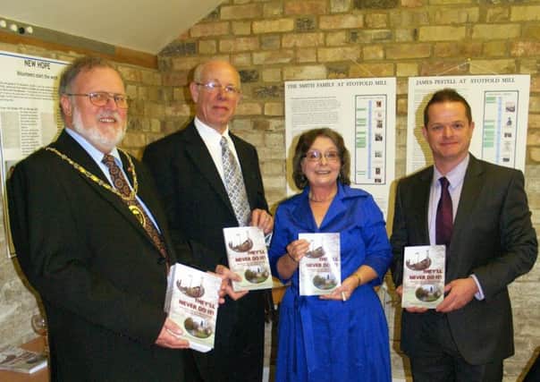 Mayor Brian Collier, Ron Roper and the authors Pam Manfield and Trevor Radford at the book launch. PNL-140430-161531001