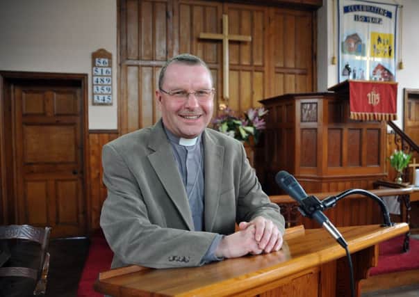 Reverend Andrew Hollins