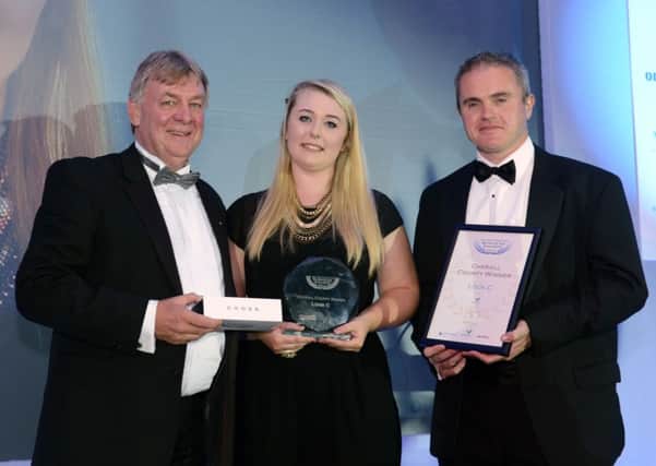 Overall County Winner Georgia O'Keefe, of Look C with Ian Cording, chairman of Bedfordshire FSB, left, and Daniel Whittemore of headline sponsor Center Parcs PNL-140630-121618001
