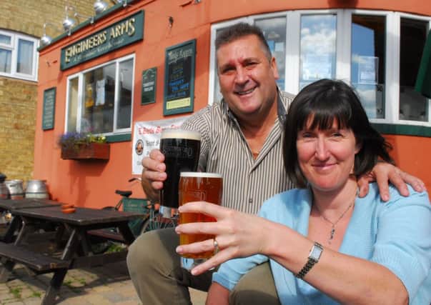b11-1088  Engineers Arms Henlow  has won CAMRA's East Anglia Pub of the Year 2011.  JE wk 38  

Landlord Kevin Machin and his partner Claire Sturgeon. ENGPNL00120110921170808