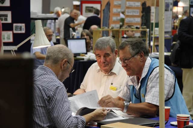 Visitors enjoying one of the ScalefourSociety's model railway exhibition shows last year