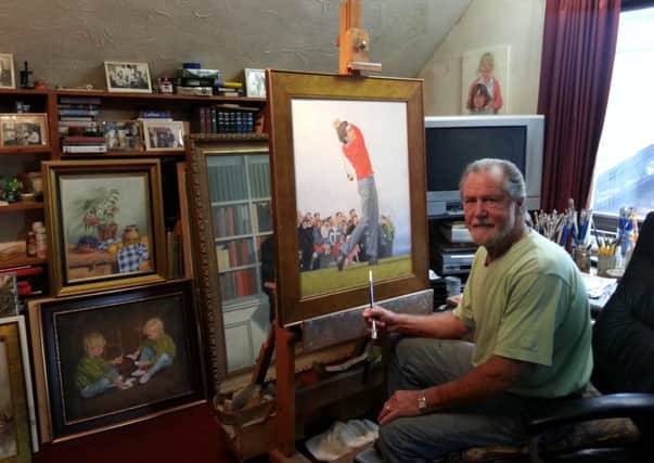 Artist Peter Deighan in his Luton studio