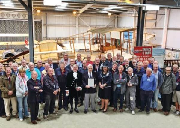 The prestigious Queens Award for Voluntary Service 2014 was presented by HM Lord-Lieutenant of Bedfordshire, Helen Nellis to the Working Volunteer members of the Shuttleworth Veteran Aeroplane Society (SVAS PNL-140210-094522001