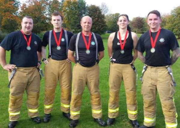 Airfield Volunteer Fire Service took part in a Fun Run wearing all of their apparatus