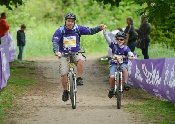 Robert Ayers and son Thomas take part in last year's Thames Bridges Bike Ride