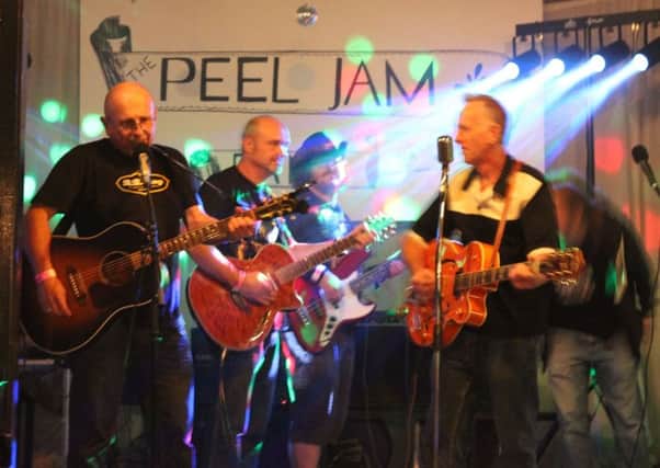 Sir William Peel pub at Sandy holds a music night for charity.