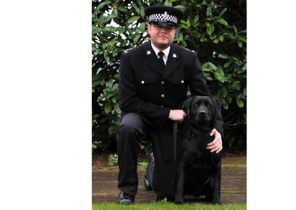Special Police Dog Handler John Power and Charlie PNL-150825-124039001