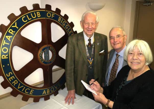 Former Chronicle reporters Colin and Carole Lee with Biggleswade Rotary Club president John Scott.