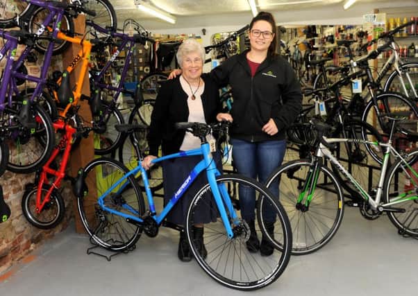 Jessie Hailstone turned 80 in October, but she still works part time at Mick's Cycles (She established  the business 45 years ago)

Pictured: Jessie with Granddaughter Chloe ANL-160222-211335009