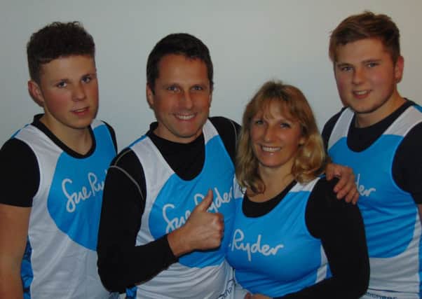 Team Miller for Sandy 10-mile race for St John's  - Paul Miller and Mandy Brundel with Paul's sons James and Lewis.
