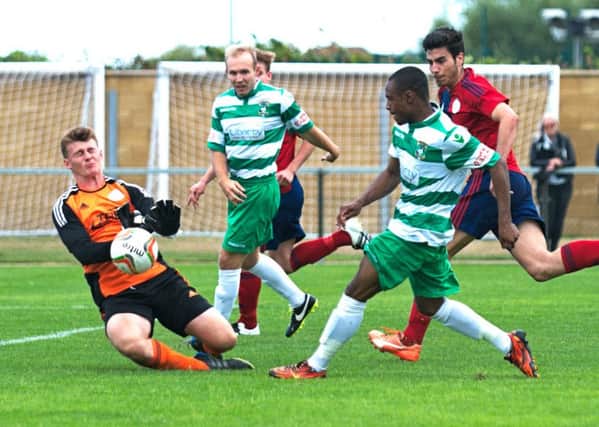Aylesbury United's Alvin Rajaram thwarted by an excellent save by Biggleswade keeper Tom Wyant