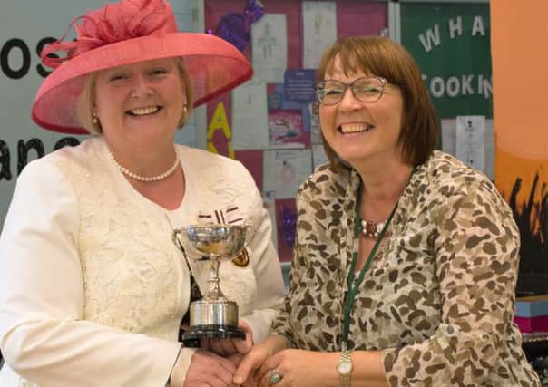 Deputy Lieutenant Ruth Bell and Kay Eldred, winner of The Wine Cup. Picture: Gareth Jones. PNL-160824-115316001